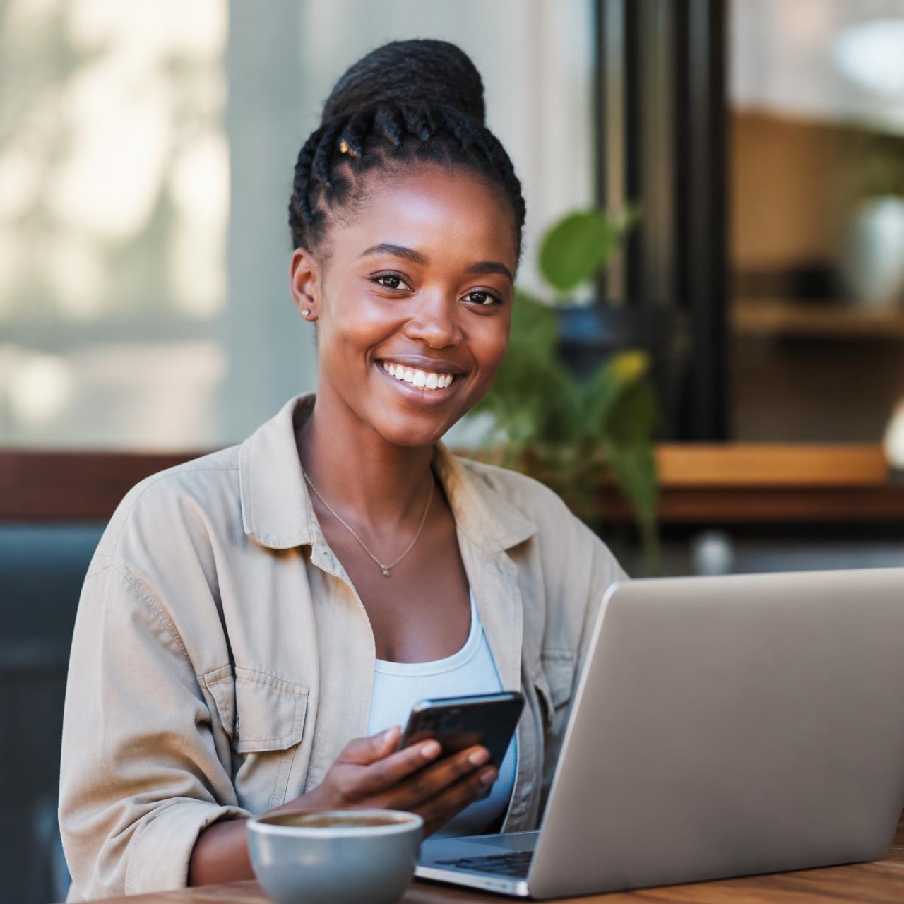 A SurveyKenya member completing a survey on her phone in Nairobi